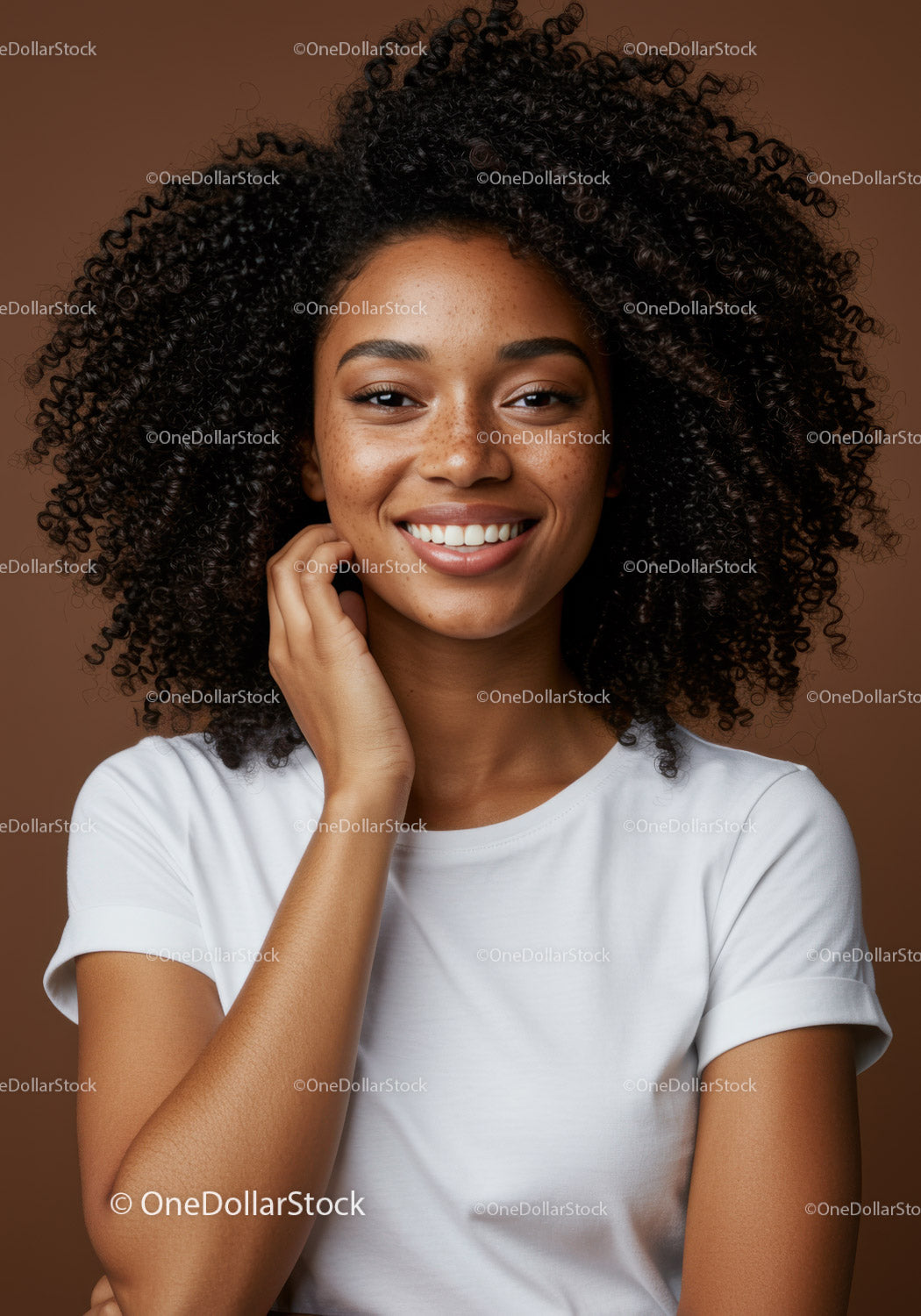 Portrait of a Smiling Woman with Curly Hair in Casual Attire