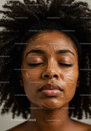 Woman Relaxing with Facial Mask in Spa Setting