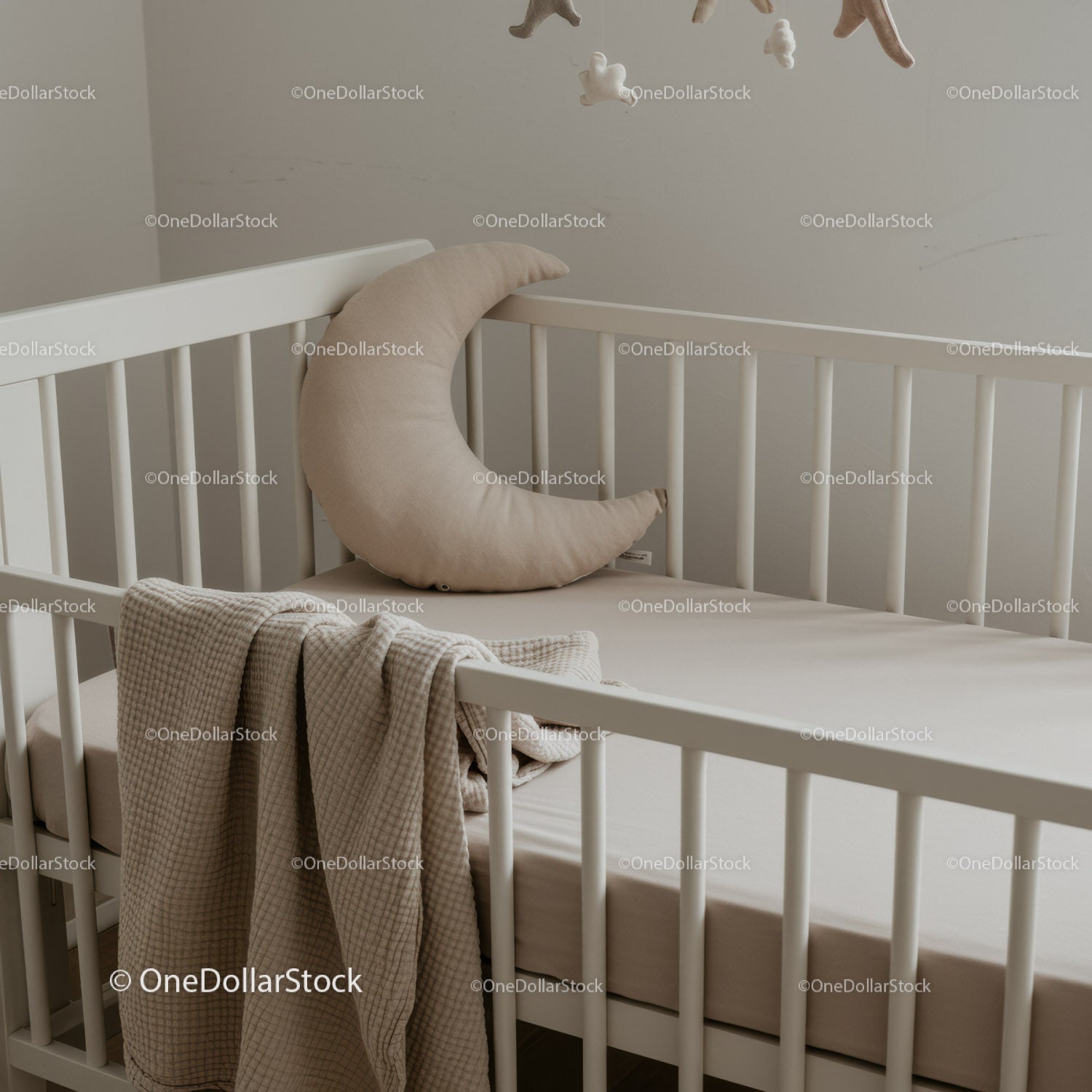 Minimalist Baby Crib with Crescent Moon Pillow and Blanket