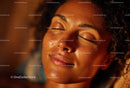 Natural Beauty of a Woman with Curly Hair in Sunlight Portrait