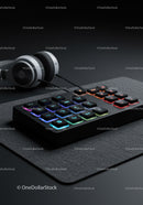 RGB Backlit Gaming Keyboard with Headphones on a Modern Desk
