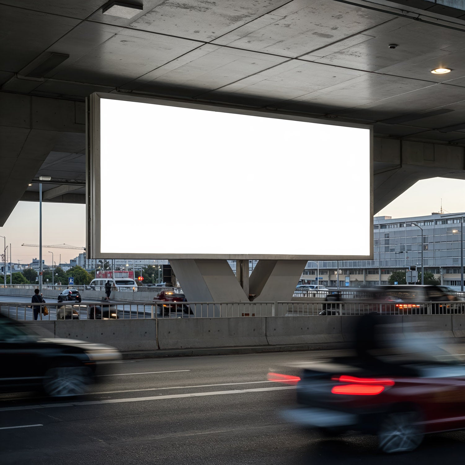 Blank urban billboard over busy city highway at dusk