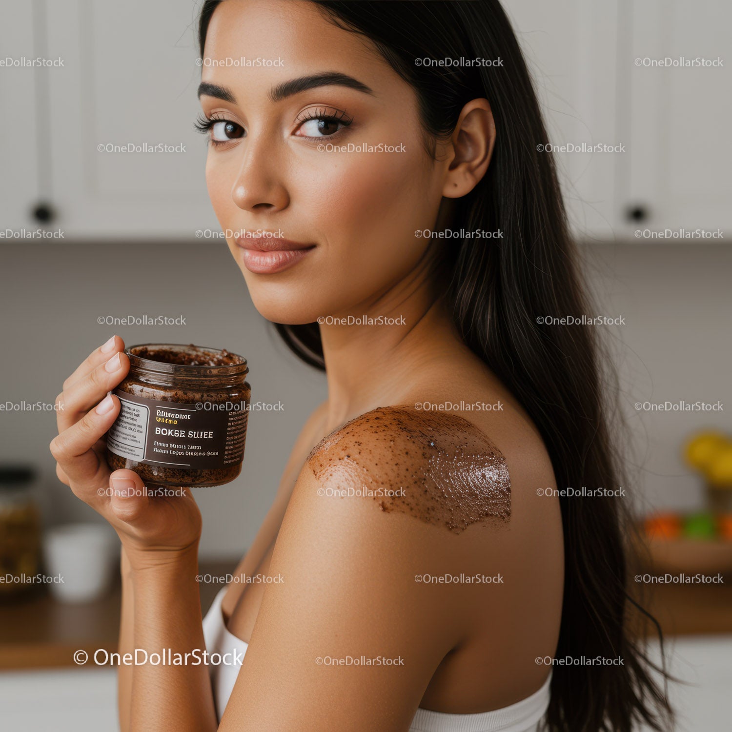 Young Woman Applying Coffee Scrub for Beautiful Skin