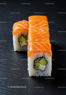 Fresh salmon sushi rolls with avocado and cream cheese