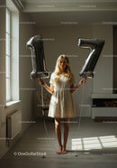 Young woman celebrates seventeenth birthday indoors