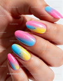 Close up of colorful gradient nail art with glitter