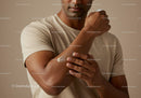 Close-Up of Man Applying Moisturizer on Arm for Skincare Routine