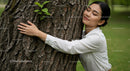 Joyful Woman Relaxing Outdoors in Natural Light