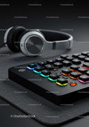 Wireless Headphones and RGB Backlit Gaming Keyboard on Desk