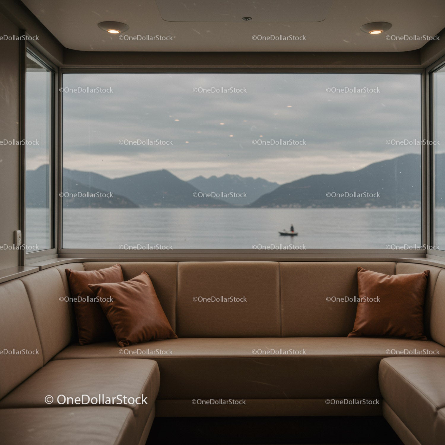 Serene Lake View from Cozy Indoor Seating with Mountain Scenery