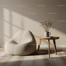 Cozy soft armchair with wooden side table in sunlight