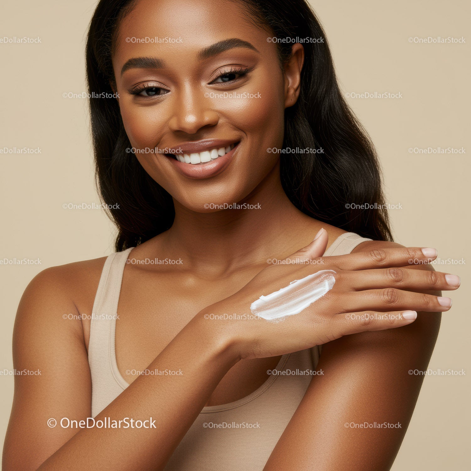 Smiling Woman with Flawless Skin Holding Skincare Product in Beige Background