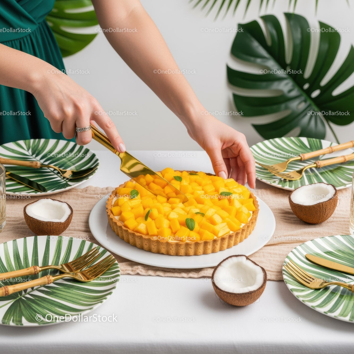 Elegant Tropical Fruit Tart with Mango and Green Monstera Plant