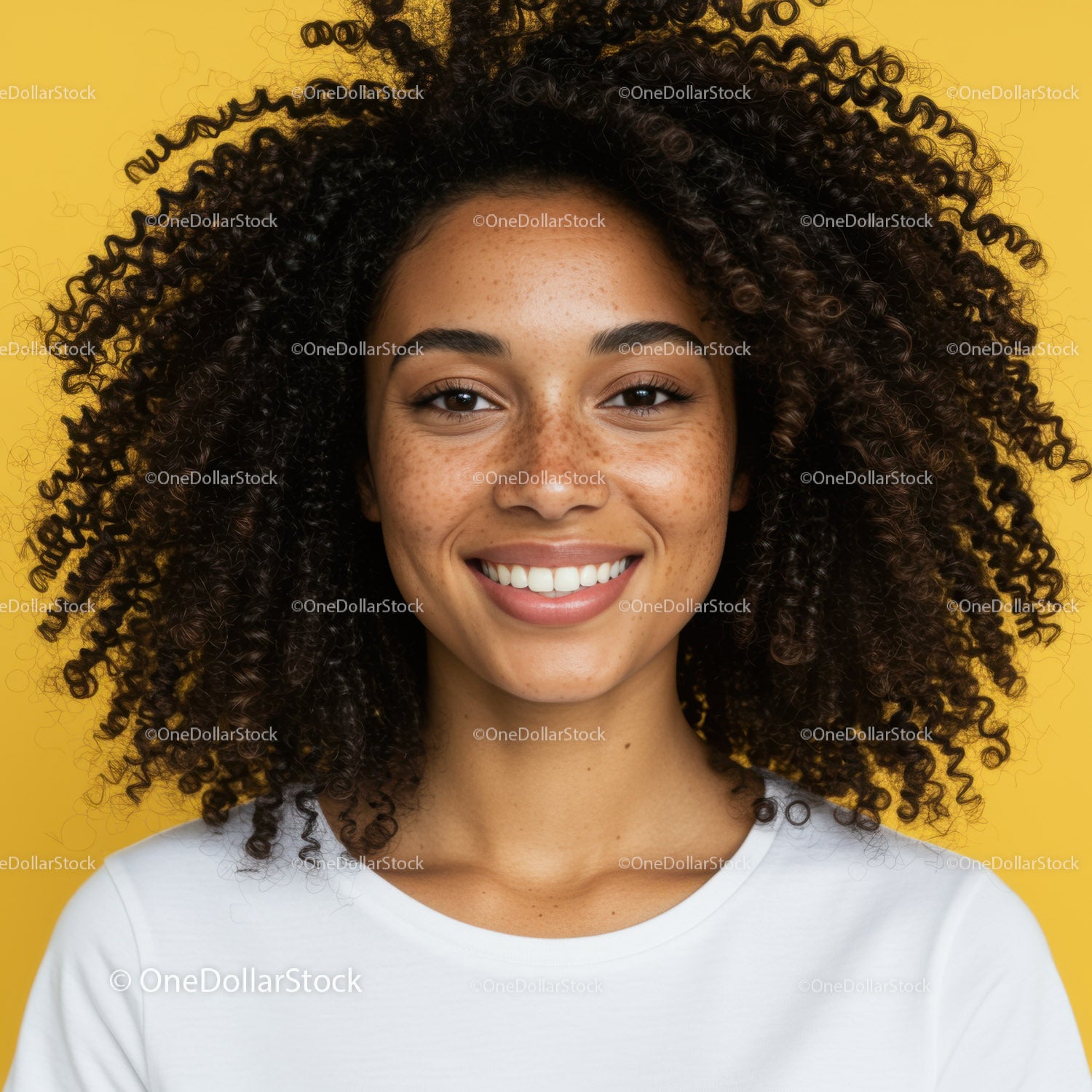 Happy Young Woman with Curly Hair Against Bright Yellow Background
