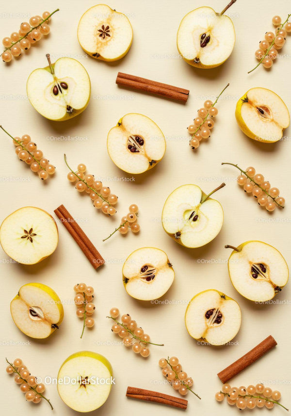 Flat Lay of Fresh Apples Slices with White Currants and Cinnamon