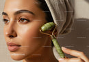Close-up of Woman Using Jade Roller for Facial Skincare