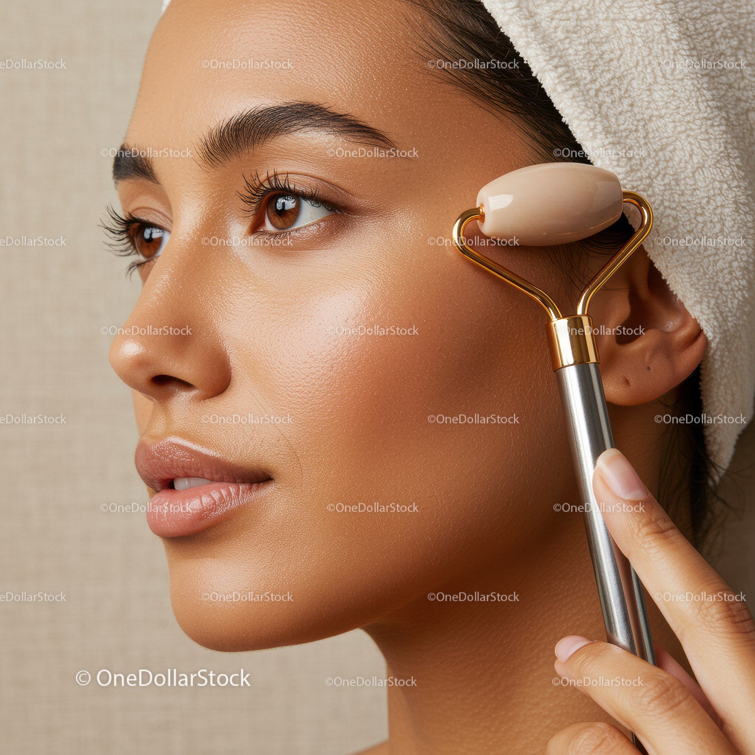 Close Up of Woman Using Jade Facial Roller for Skincare Treatment