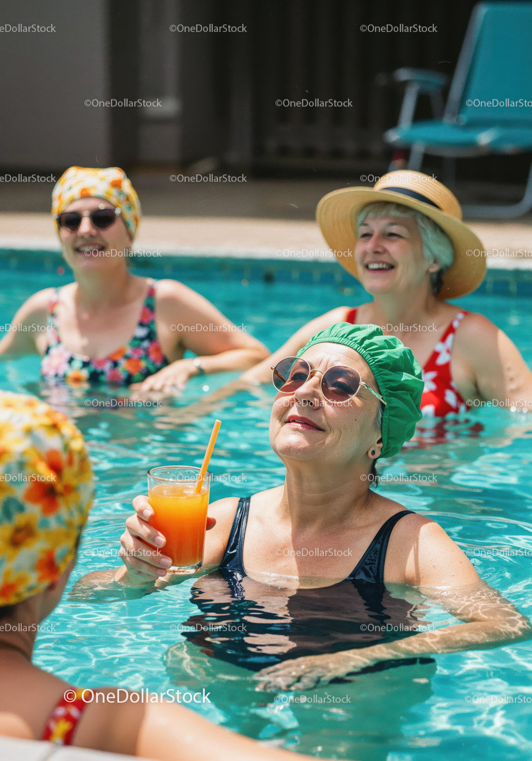 Elderly Women Relaxing and Drinking Refreshing Drinks in Pool
