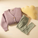Cozy knitted cardigan with soft yellow cloud pillow