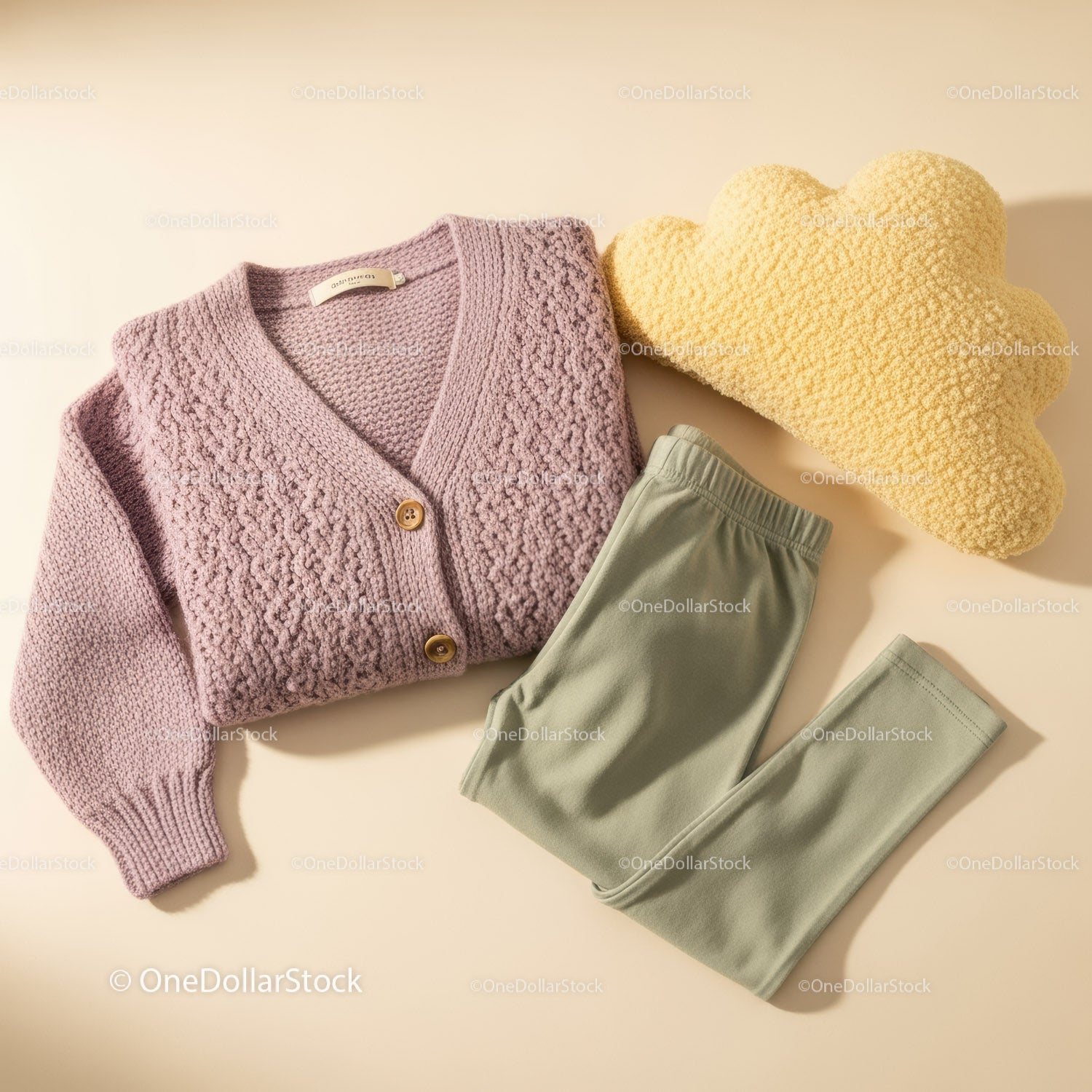 Cozy knitted cardigan with soft yellow cloud pillow
