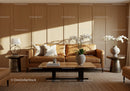 Cozy living room with leather sofa and orchid decor