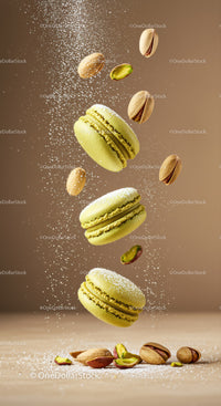 Green pistachio macarons with powdered sugar and nuts