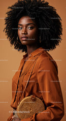 Elegant African American Woman in Satin Shirt and Wicker Bag Portrait
