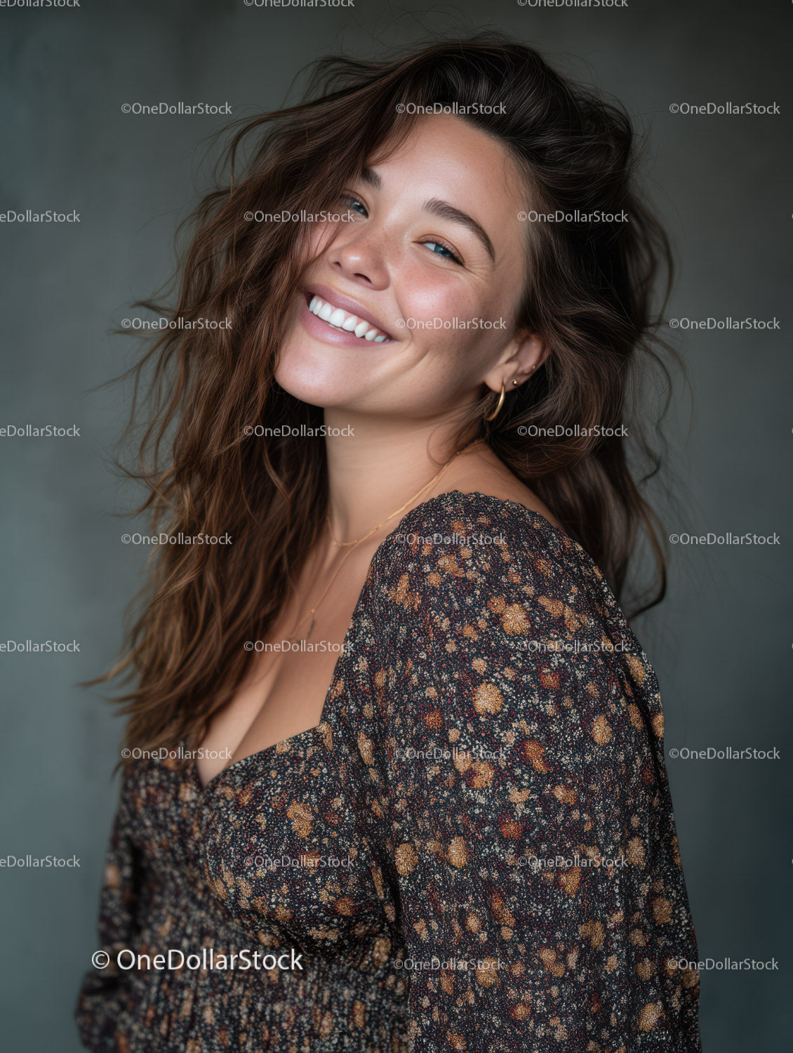 Joyful Woman in Floral Dress with Bright Smile Studio Portrait