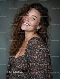 Joyful Woman in Floral Dress with Bright Smile Studio Portrait
