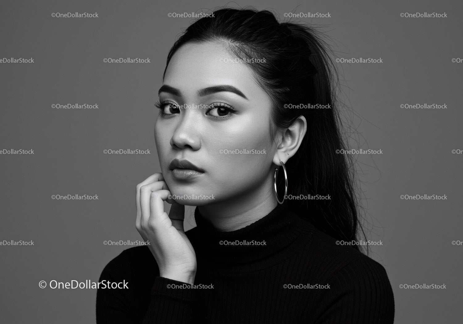 Elegant Black and White Portrait of a Stylish Young Woman