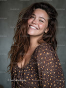 Smiling Young Woman with Wavy Brown Hair Wearing Floral Dress