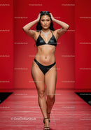 Fashion Model Walking on Runway in Black Bikini and Jewelry