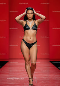 Fashion Model Walking on Runway in Black Bikini and Jewelry
