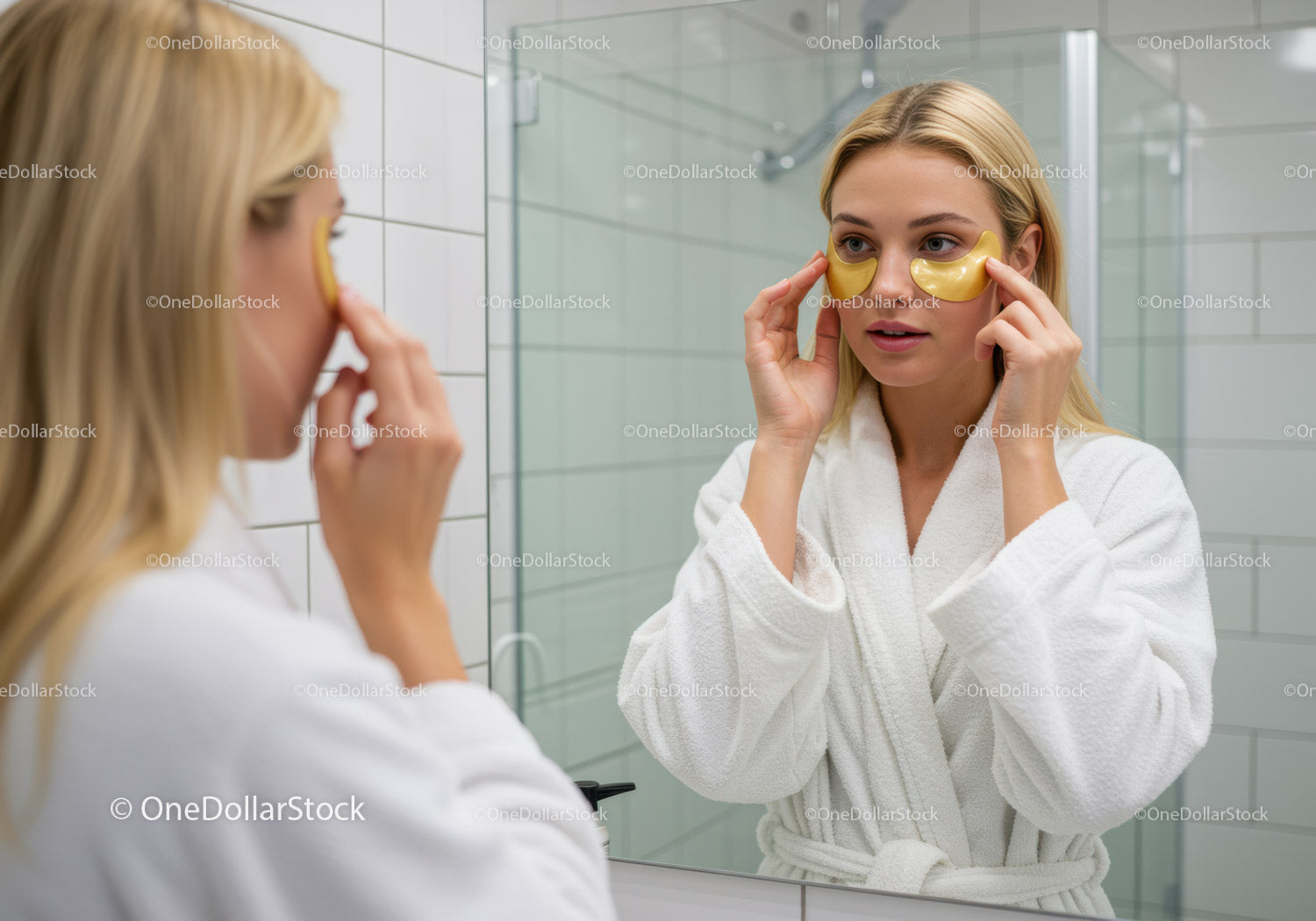 Young Woman Applying Gold Eye Patches for Skin Rejuvenation