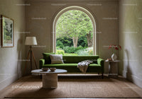 Cozy living room with green sofa and garden view