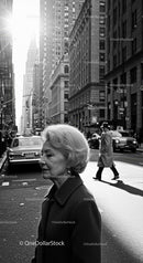 Elderly Woman Crossing Street in Busy Urban Cityscape