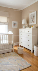 Bright Children's Nursery with White Dresser and Playful Decor