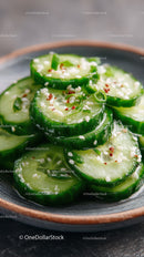 Fresh Sliced Cucumbers in a Ceramic Bowl