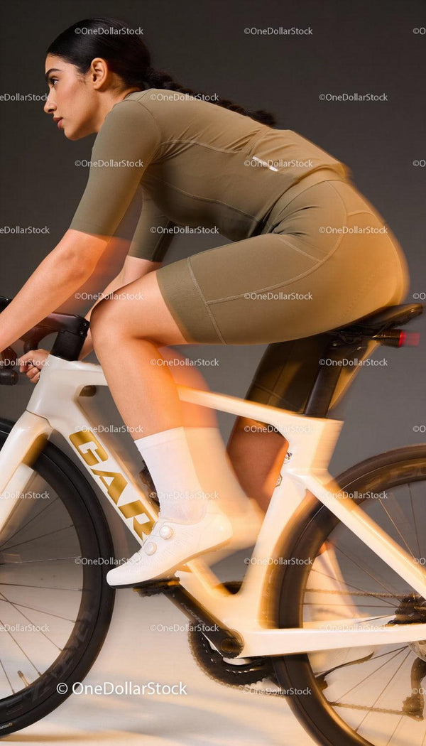 Focused cyclist training intensely on a modern road bike