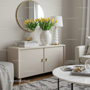 Elegant Living Room Decor with Yellow Tulips and Modern Accessories