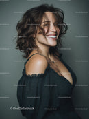 Portrait of a Smiling Woman with Curly Hair in Trendy Fashion