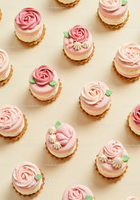 Mini Pink Rose Cupcakes with Cream and Decorative Leaves