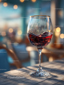Elegant Red Wine in a Crystal Glass on a Stylish Wooden Table