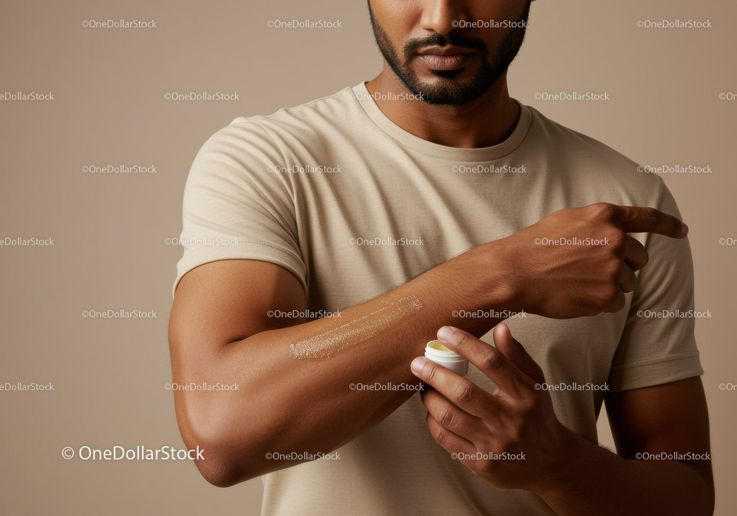 Male Man Applying Sunscreen on Arm for Sun Protection Skincare