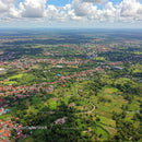 Aerial View of Green Countryside with Forests and Fields