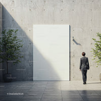 Businesswoman Approaching Blank Concrete Wall in Courtyard