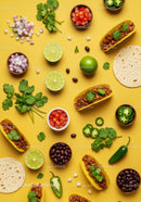 Flat Lay of Tacos with Fresh Ingredients on Yellow Background