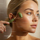 Woman Using Jade Roller for Facial Massage with Glowing Skin