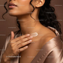 Close-Up of Woman Applying Moisturizer on Neck and Shoulder