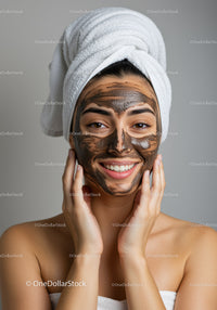 Woman with Facial Mask and Towel Turban Enjoying Skincare Routine